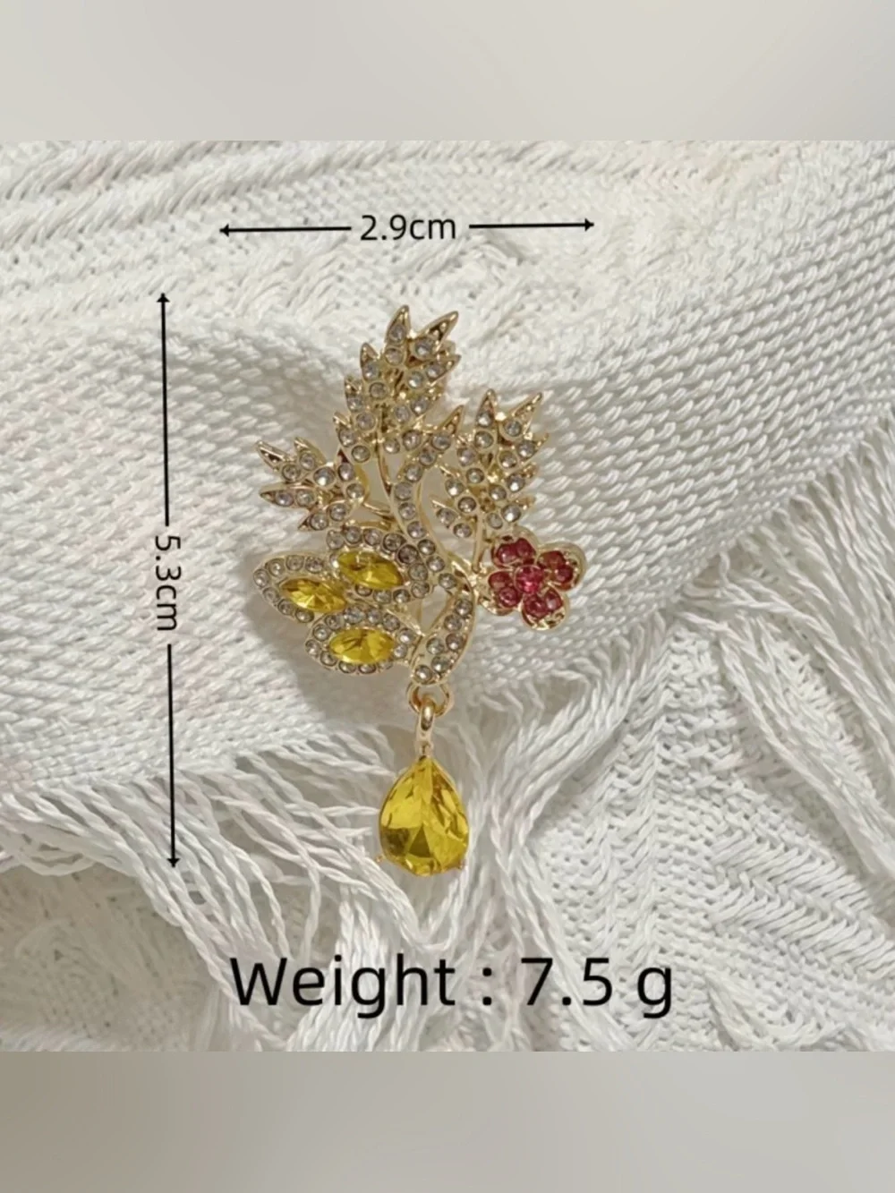 New gold-toned alloy wheat leaf brooch  a pear-cut yellow rhinestone drop